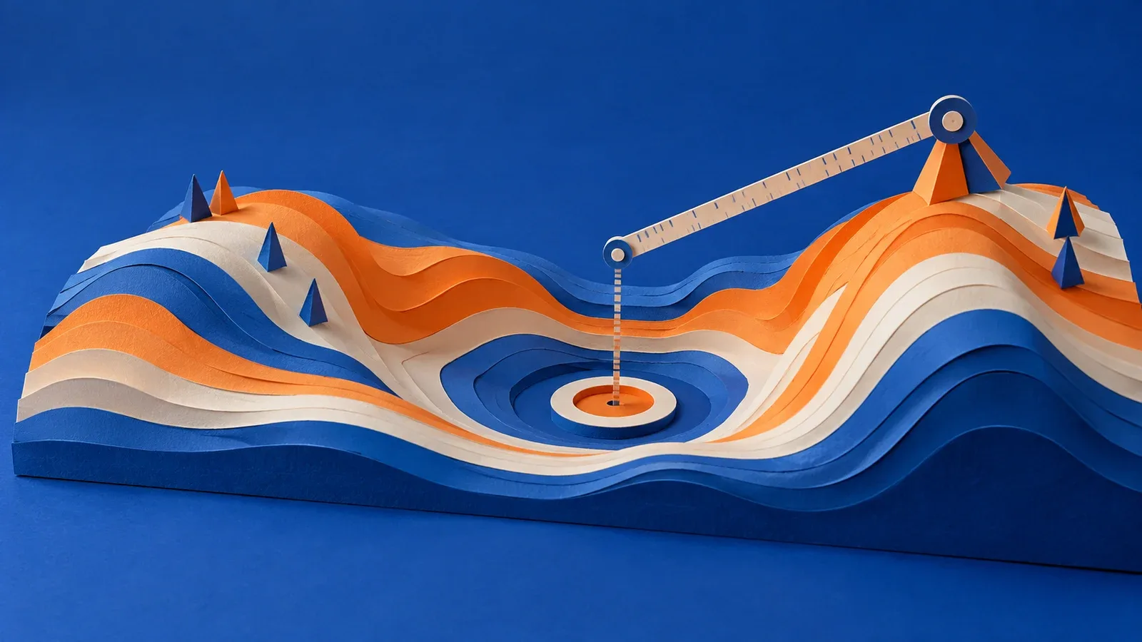Escultura geométrica em camadas de papel dobrado representando uma superfície de perda com vales e colinas em azul cobalto e laranja